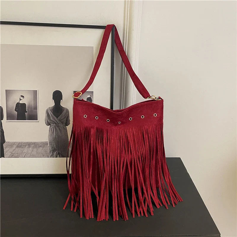 Maria boho fringe shoulder bag tan faux suede slouchy hobo silhouette with eyelet details