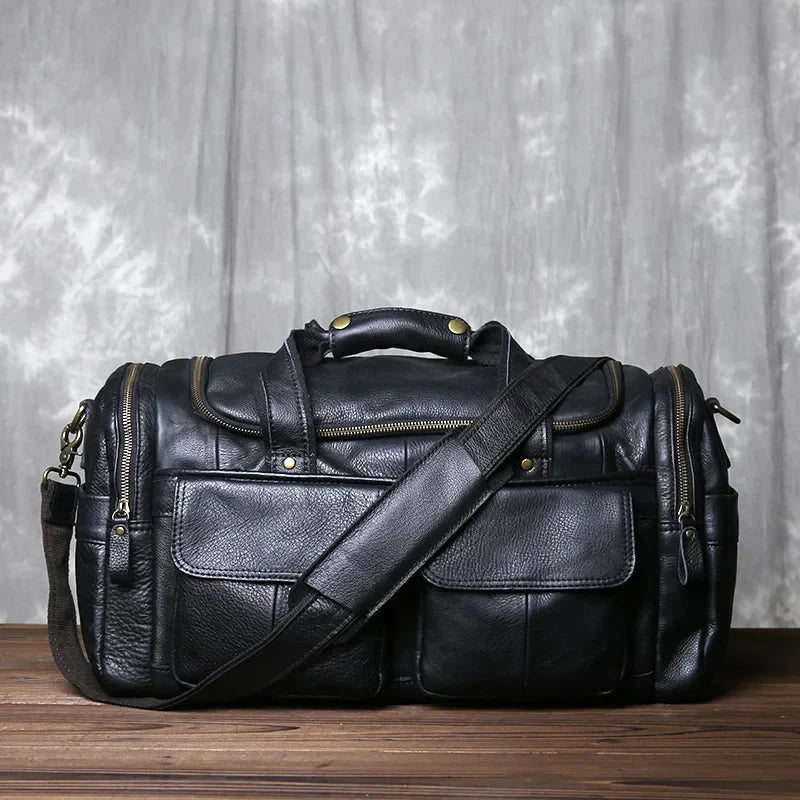 Premium brown leather structured barrel duffel bag unisex travel carry-on with organized compartments