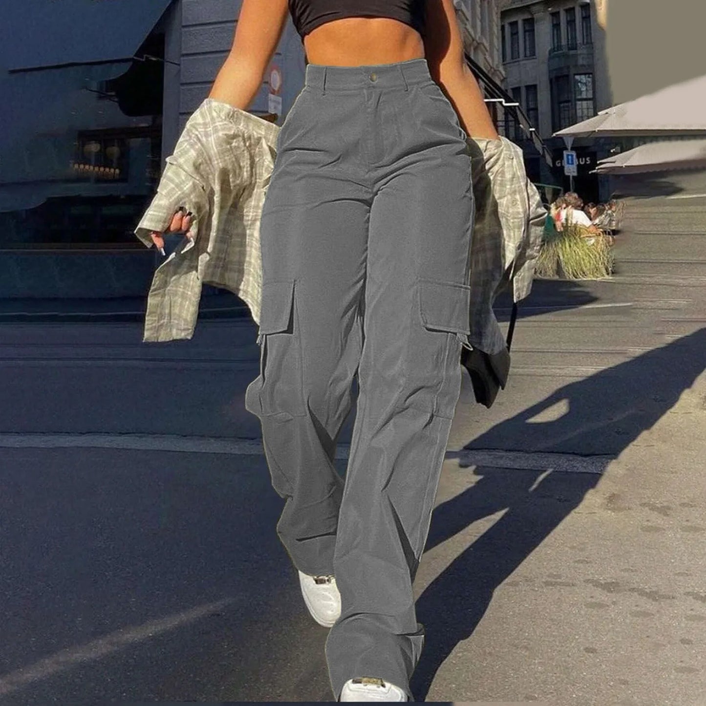 Women's high waist cargo trousers streetwear style with multi-pocket detailing for modern city looks