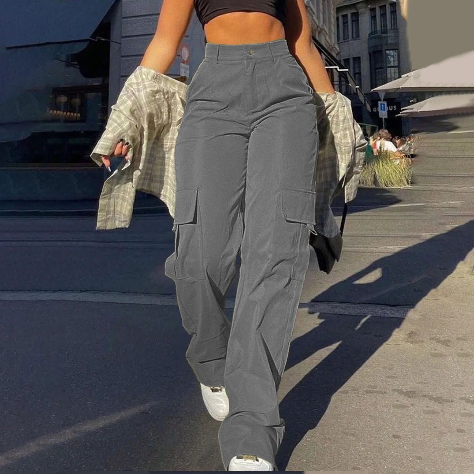 Women's high waist wide leg cargo trousers in neutral tone with functional side cargo pockets, city chic style