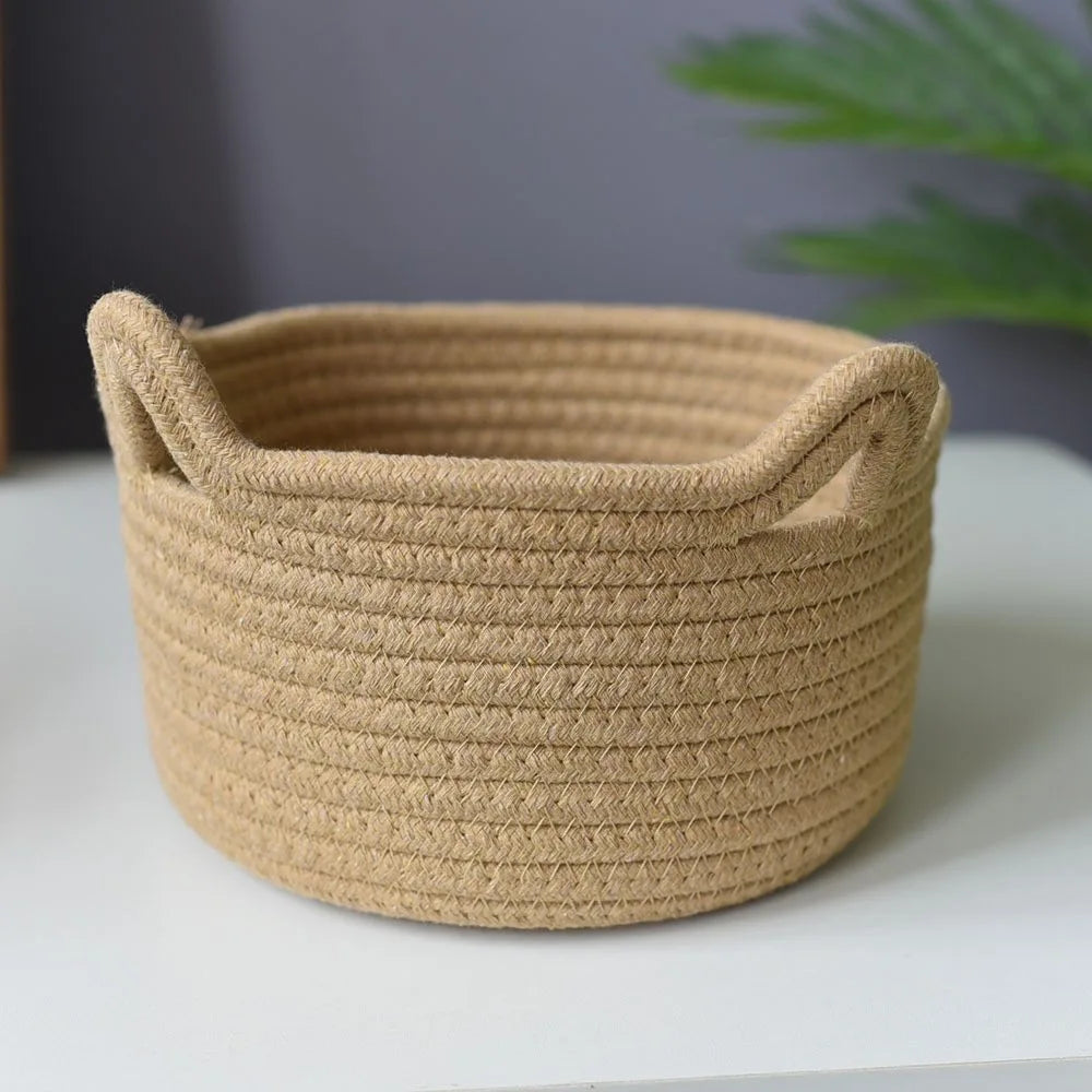 Woven cotton storage basket with cat ear handles, minimalist natural texture for chic small space organization