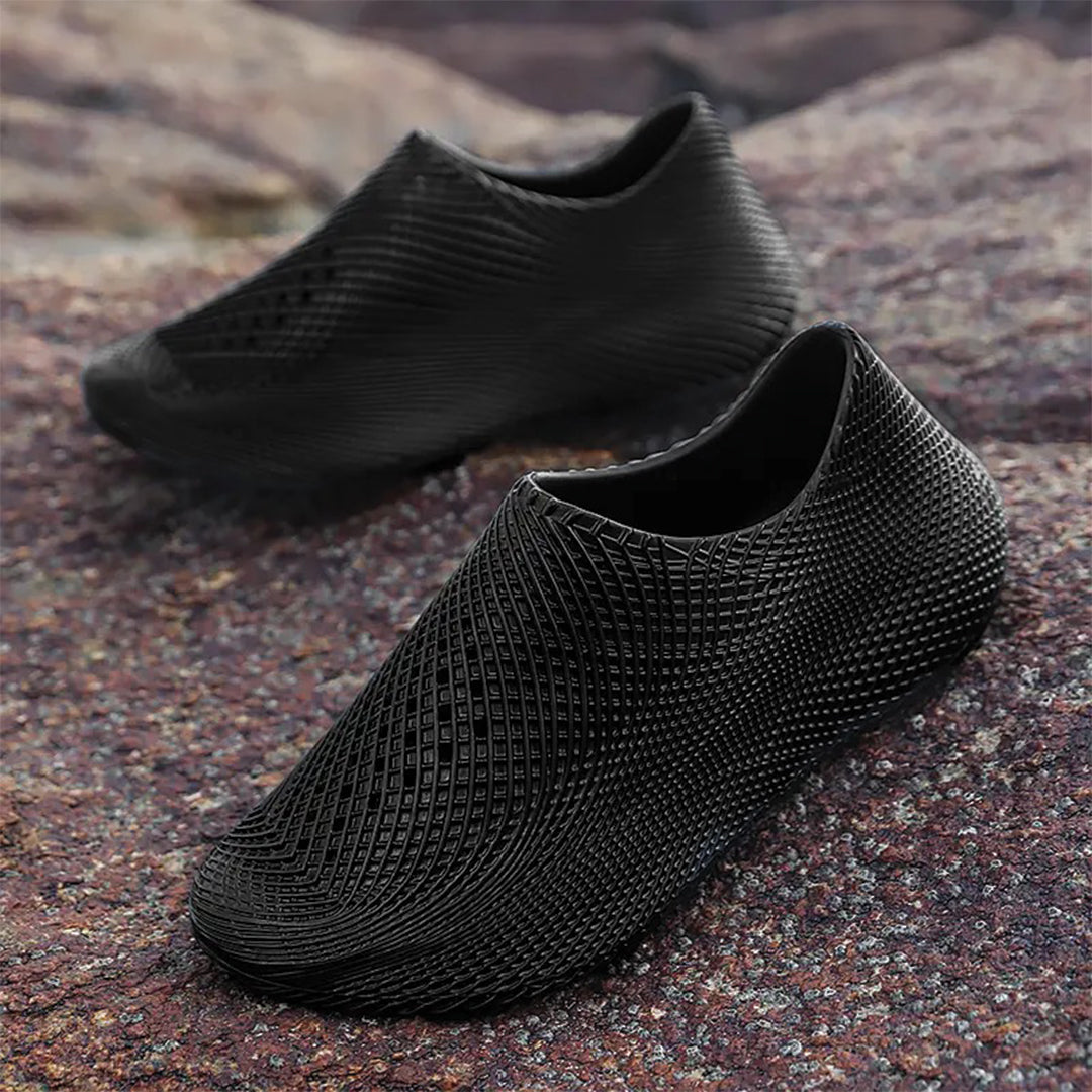 Lightweight white EVA slip-on runner slippers with kinetic-inspired contours for active athletes