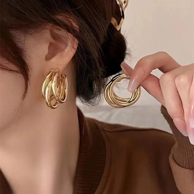 Chunky polished silver hoop earrings bold oversized silhouette non-tarnish everyday statement jewelry