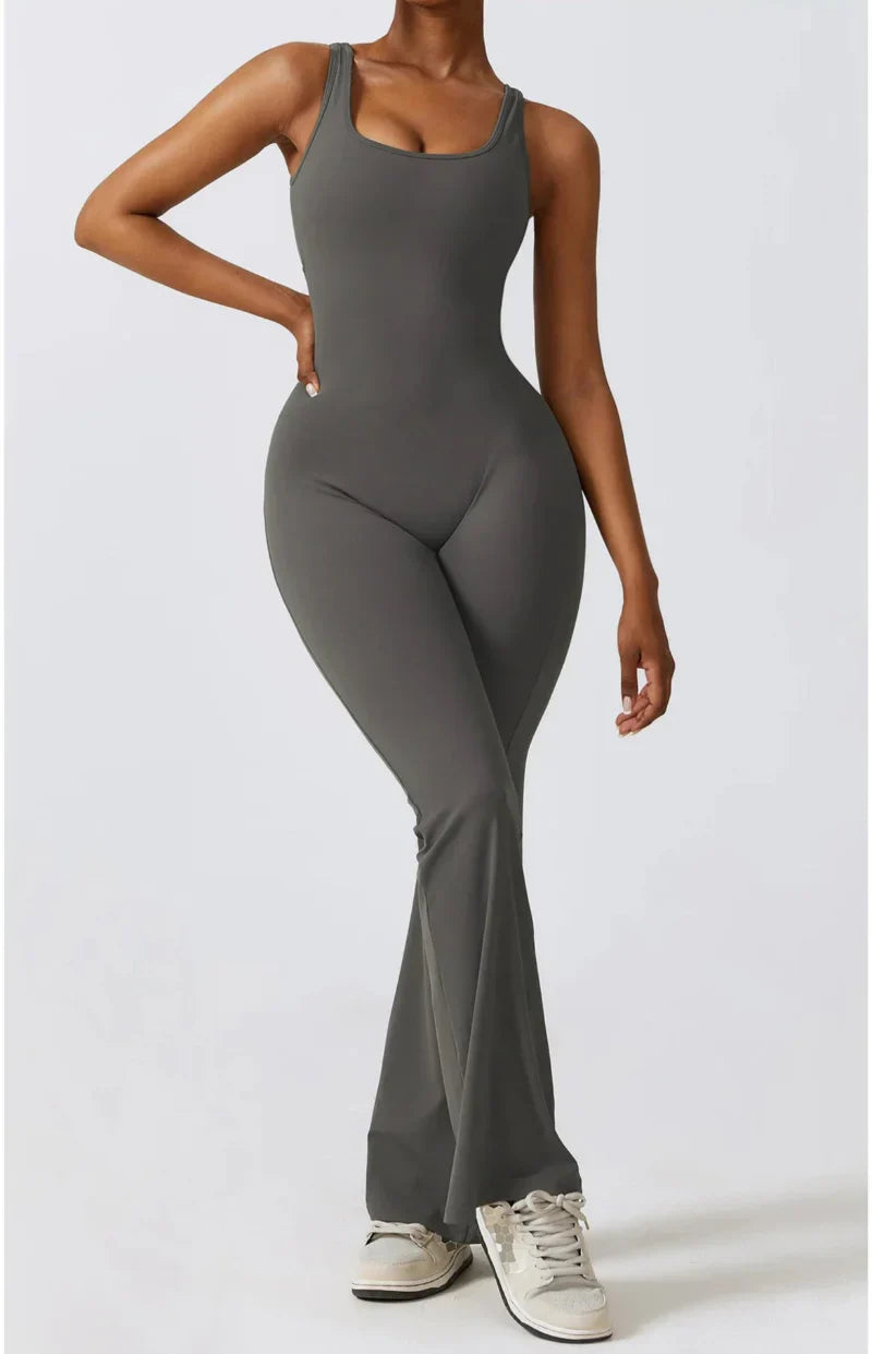 Women's black seamless training jumpsuit with compression fit and sculpted silhouette for high-intensity workouts