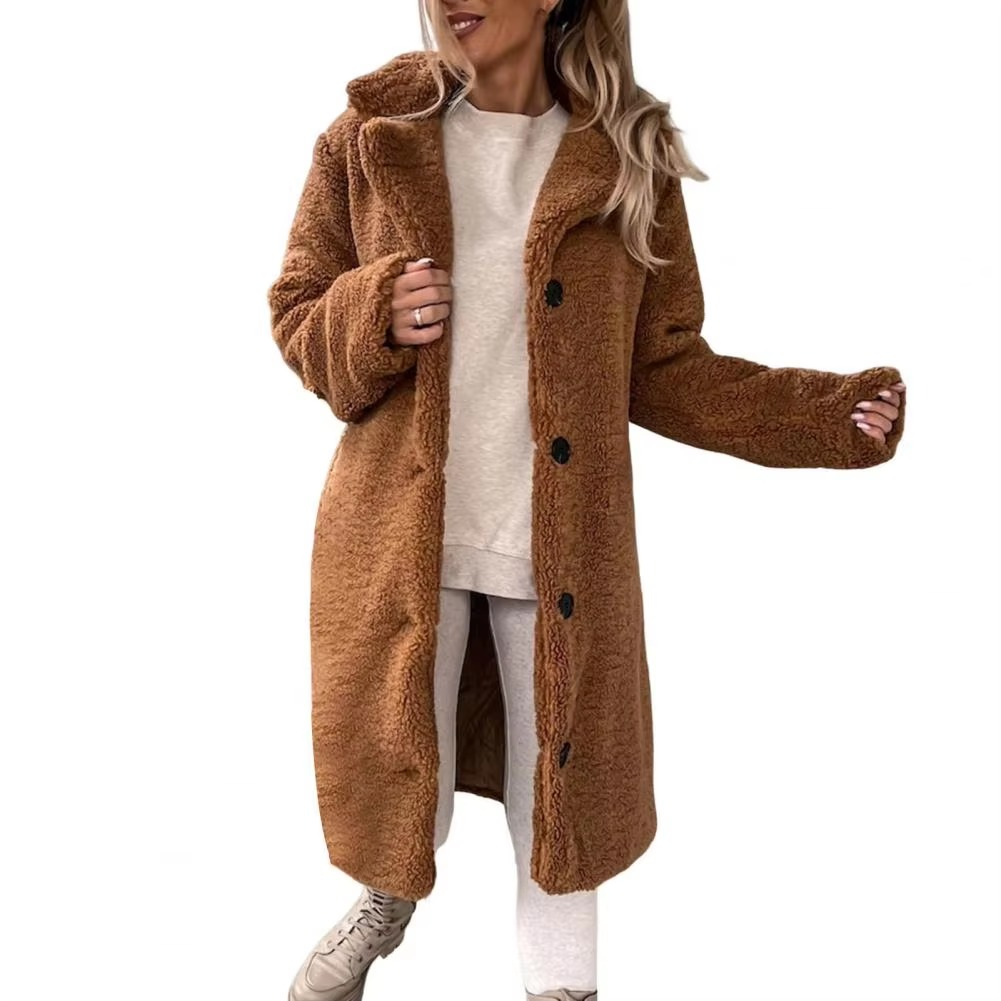 Women's oversized long teddy faux fur trench coat in plush neutral tones for winter warmth