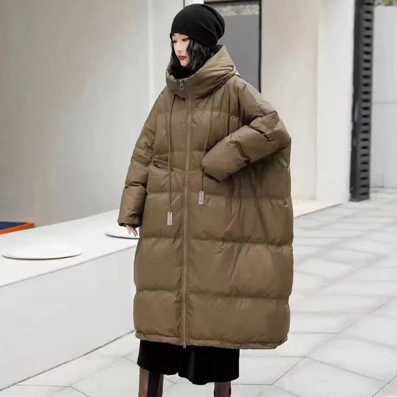 Women's longline jacket warm lined elongated silhouette soft texture timeless cold-weather elegance