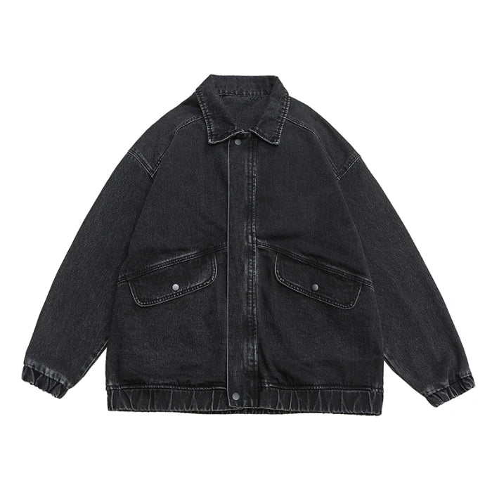 Medium wash oversized boxy denim jacket with draped sleeves and retro streetwear style
