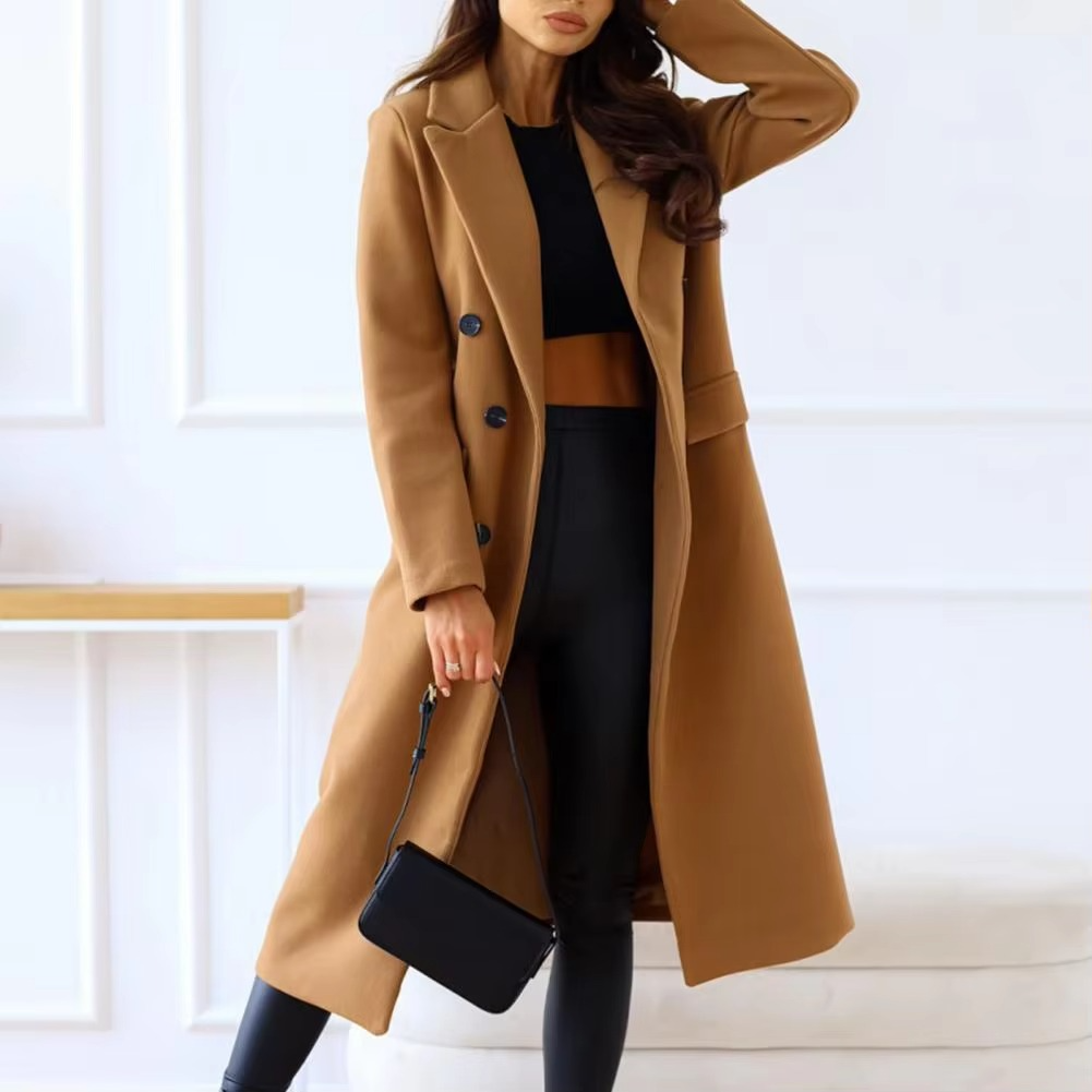 Women's double breasted mid-length winter coat with lapel, long sleeves, classic structured fit