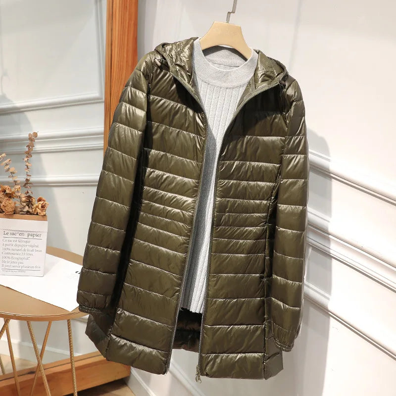 Women's long puffer jacket with hood, regular fit, elongated silhouette for cold-weather warmth