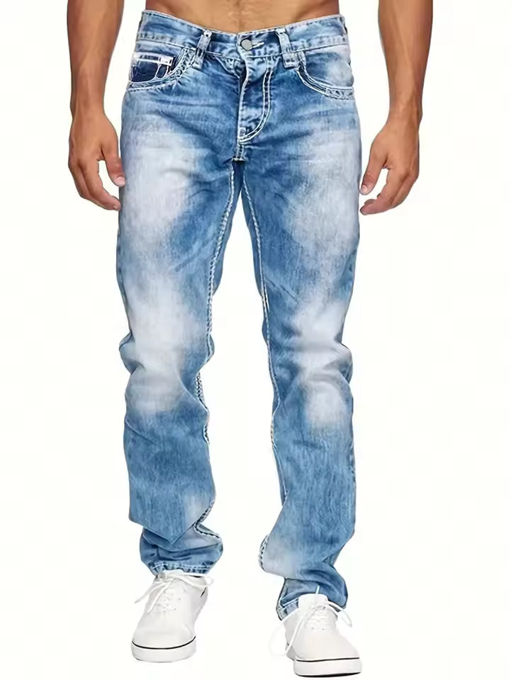 Men's straight-leg black denim jeans with bold white contrast stitching, full-length cut for everyday wear