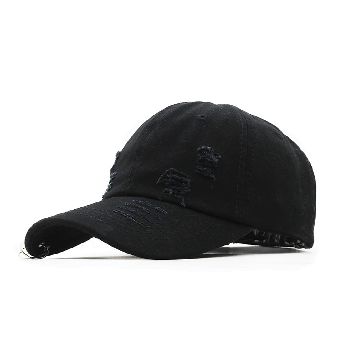 Distressed denim streetwear hat with pierced curved brim, metal hardware, and adjustable strap