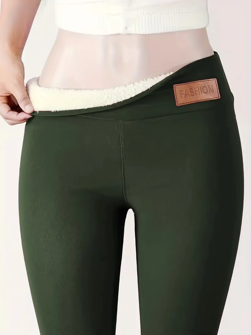 Women's black fleece-lined high-waist thermal leggings with plush interior for cold weather comfort