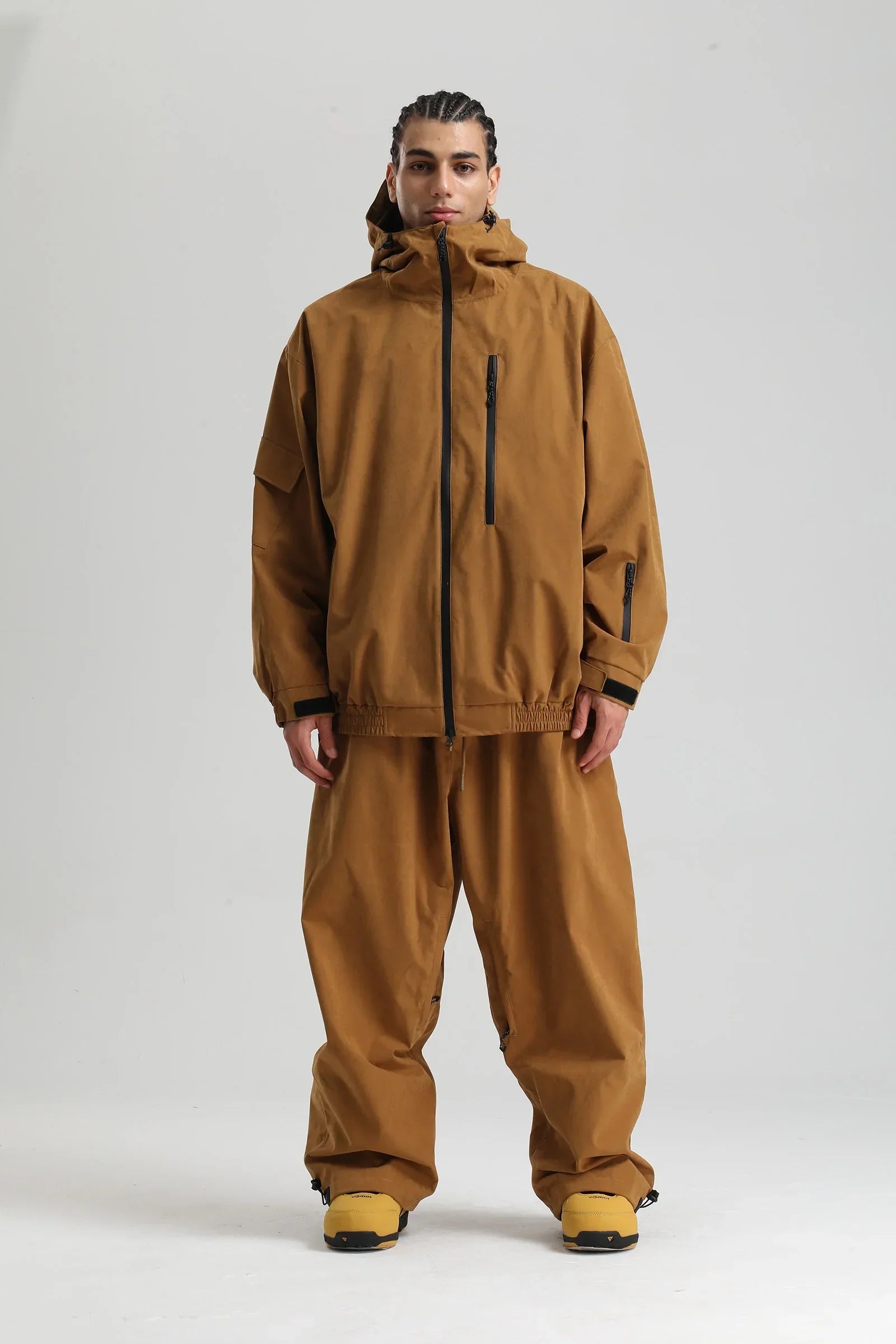 Unisex winter ski set with hood, sleek urban-mountain silhouette blending sportswear and streetwear style