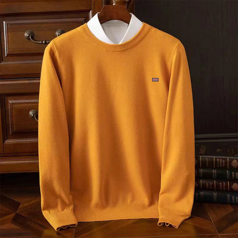 Lightweight crewneck knit sweater in neutral tone, smooth fine-knit texture, unisex tailored fit