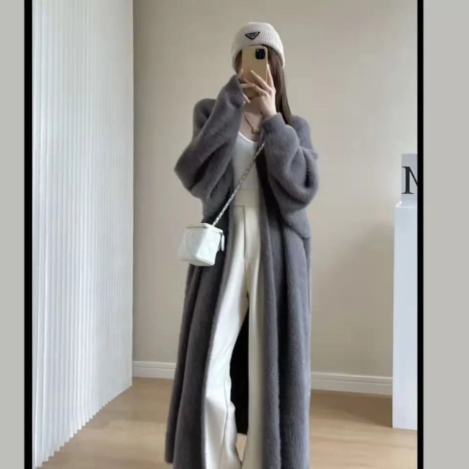 Meridian longline cashmere-blend coat in neutral tone, fluid drape, silk-soft finish for professionals