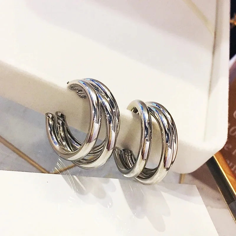 Chunky polished silver hoop earrings bold oversized silhouette non-tarnish everyday statement jewelry