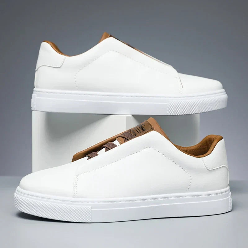 Navy faux leather low top slip-on sneaker for men with thick white sole and sleek everyday fit