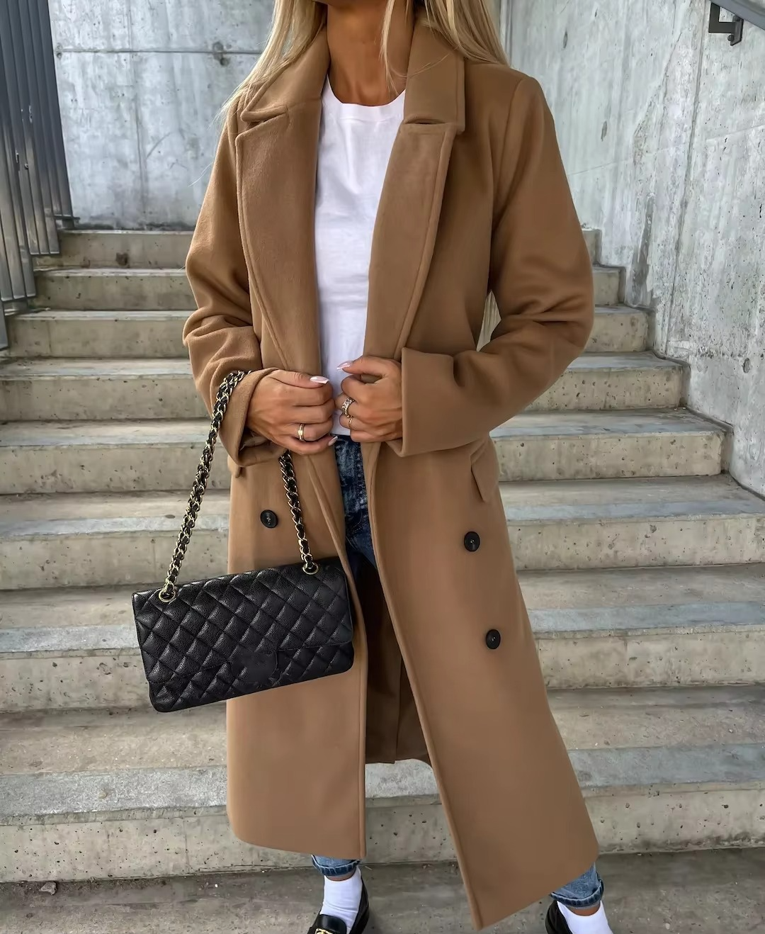 Women's long winter trench coat in classic tan, notched collar, structured button placket silhouette