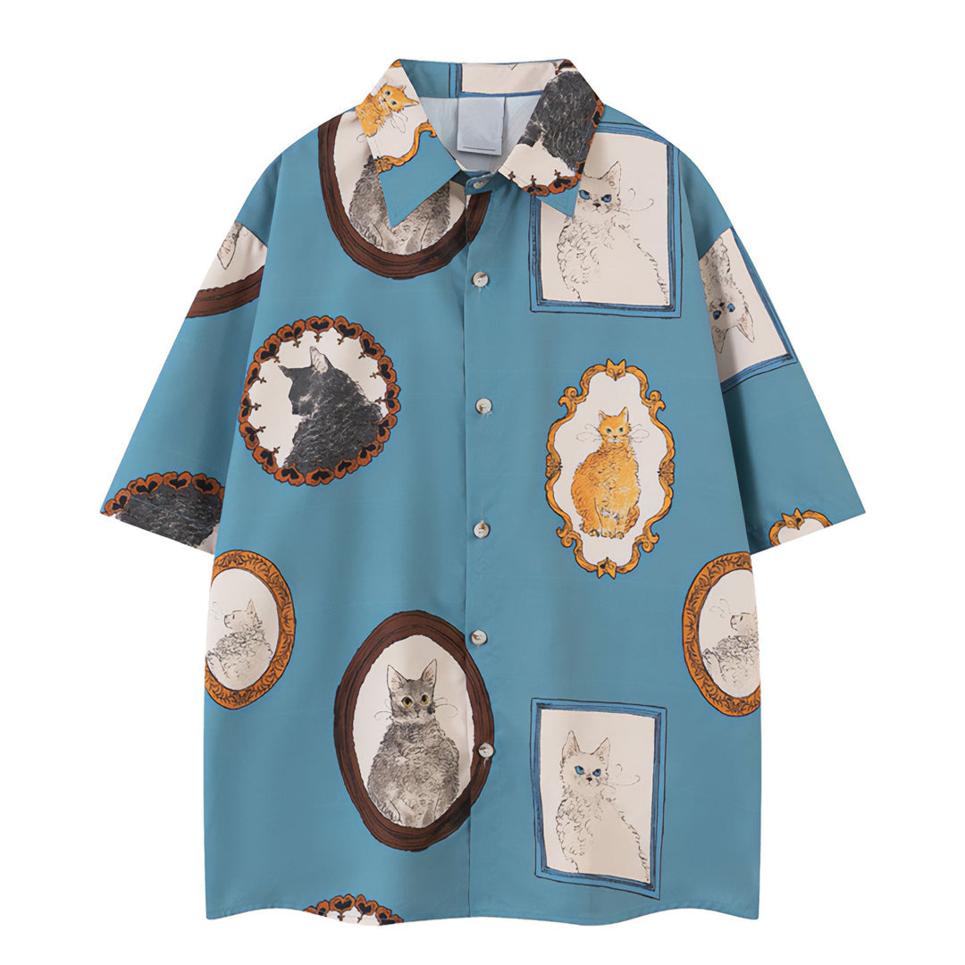 White relaxed button-down shirt with museum-framed cat portrait prints, oversized artistic fit