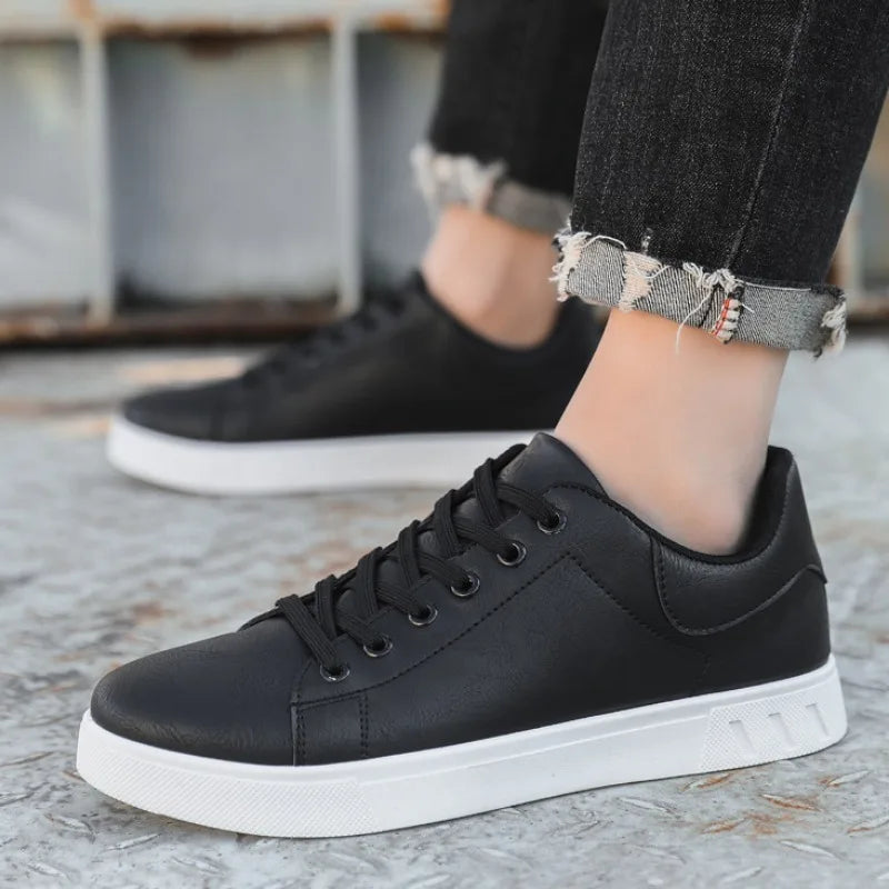 Julian white low-top lace-up vegan leather sneakers with sleek silhouette and padded insoles
