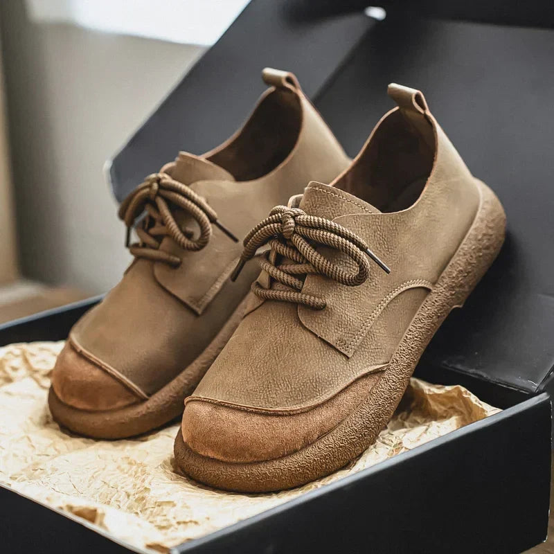 Men's distressed leather shoes with soft lining, reinforced stitching, rubber sole, rugged timeless style