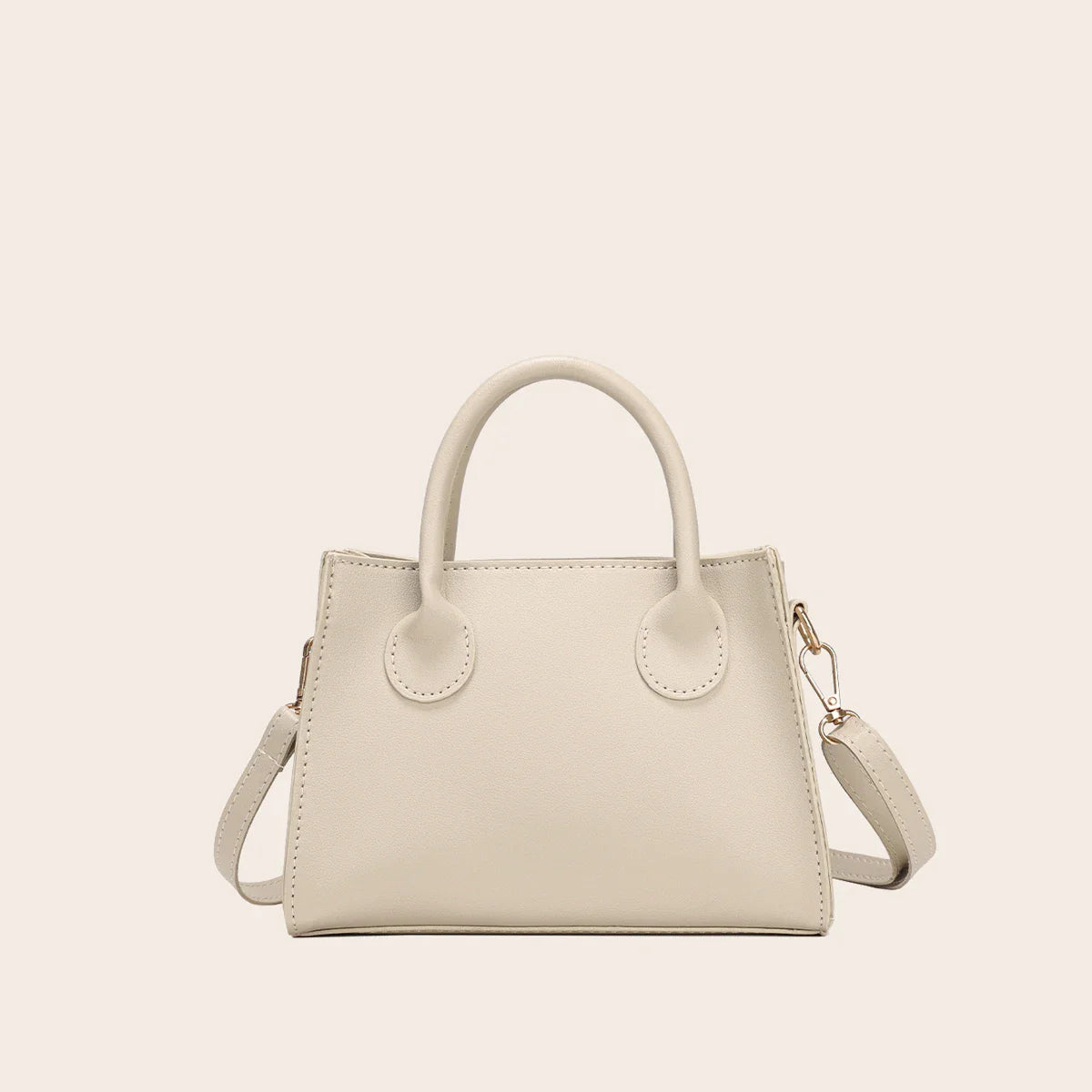 Joan vegan leather mini crossbody bag, structured chic rectangular silhouette with detachable strap