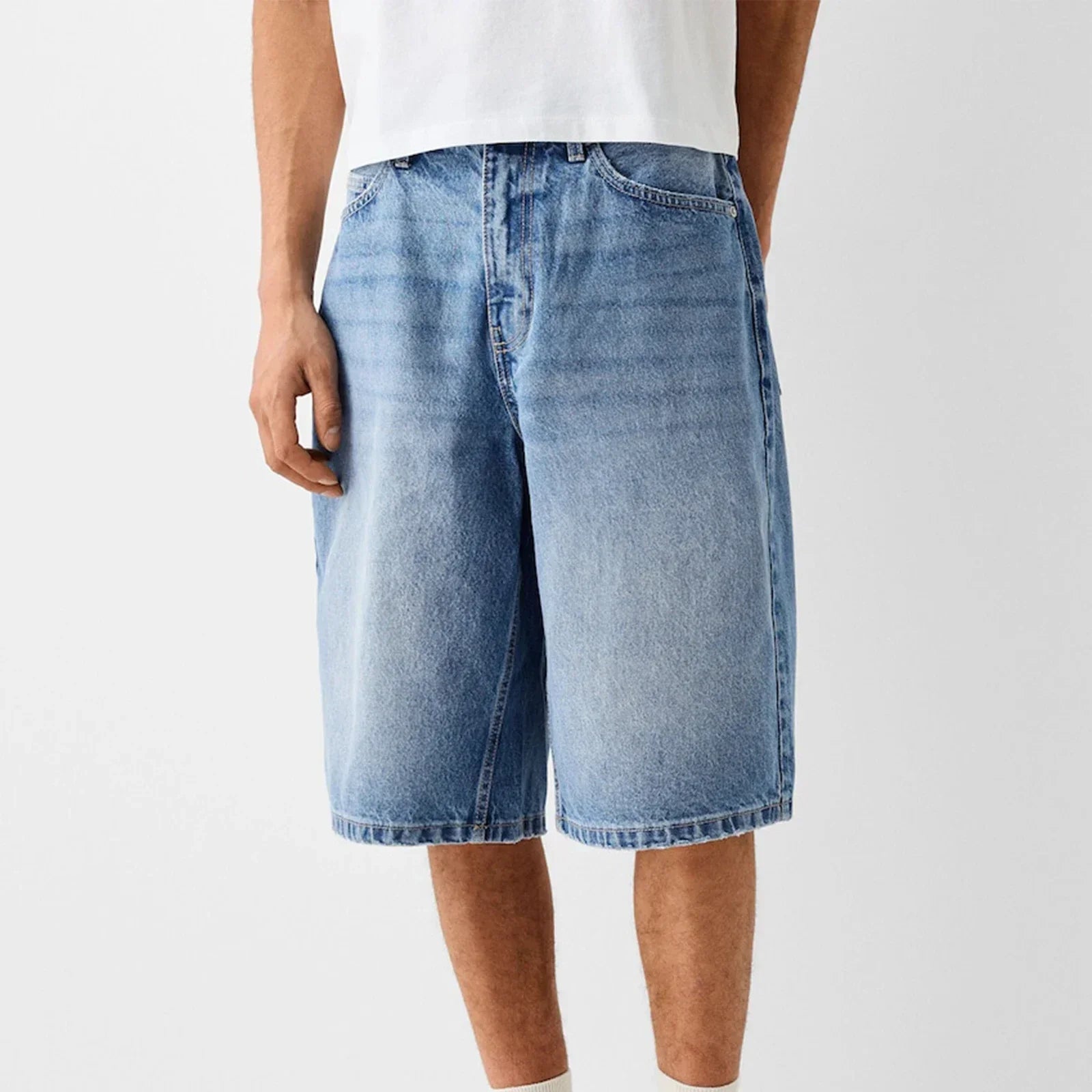Men's wide-leg relaxed denim shorts in washed blue with reinforced stitching and classic five-pocket design