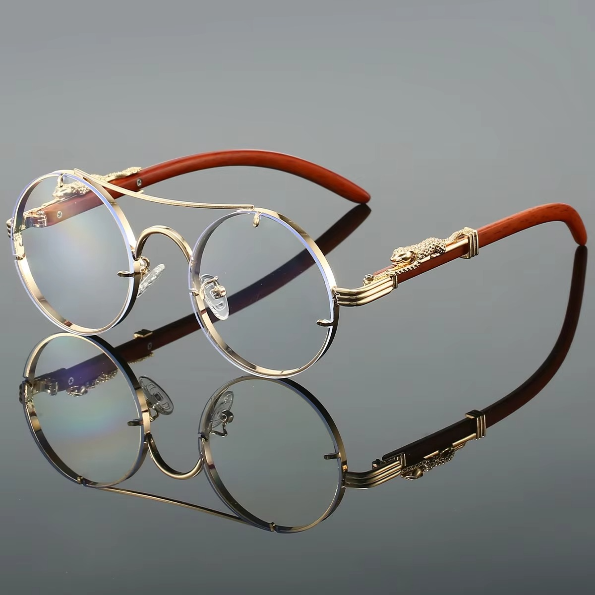 Vintage round unisex sunglasses gold double bridge frame red tinted lenses featherweight
