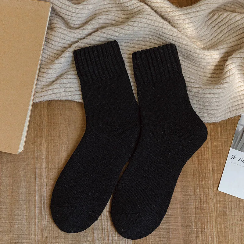Women's ribbed wool crew socks in classic neutral tones, cozy luxurious knit texture for everyday warmth