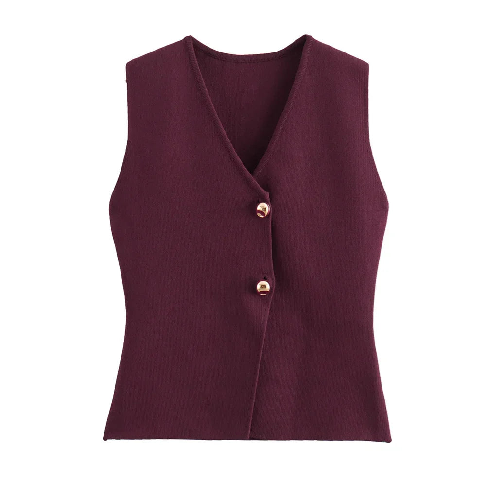 Ivory tricot knit waistcoat sculpted silhouette asymmetric wrap front gold button detail