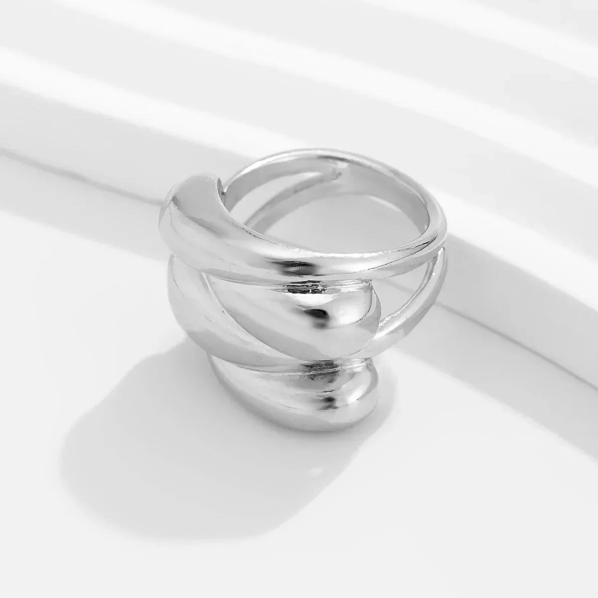 Athena geometric polished bangles unisex punk-inspired statement jewelry bold high-shine finish