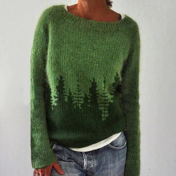Women's winter knit sweater with bold color-block pattern transitions and cozy relaxed fit