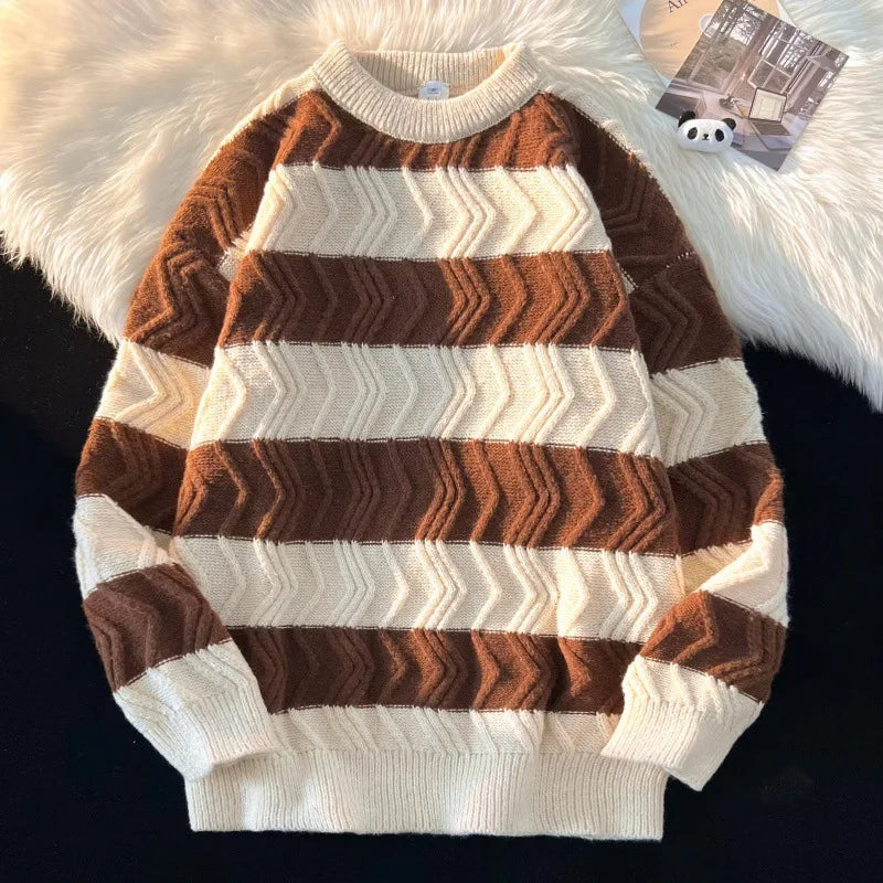 Women's cream and navy chevron stripe knit sweater with crew neckline and textured pattern