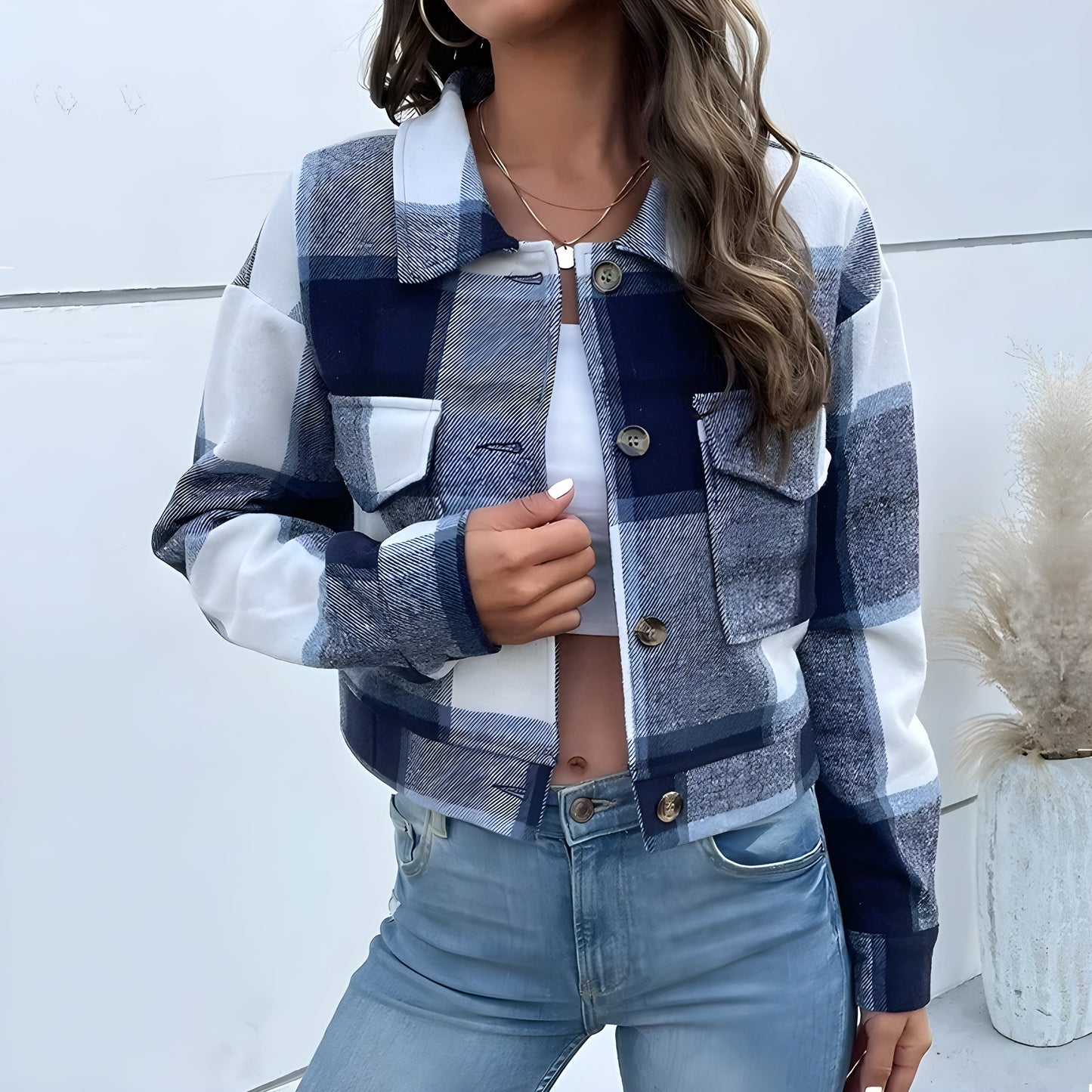 Women's cropped plaid-wash jacket with faux horn buttons, patch pockets, and soft shoulder collar