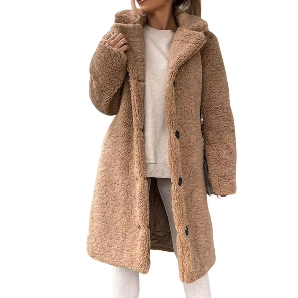 Women's oversized long teddy faux fur trench coat in plush winter warmth with longline silhouette