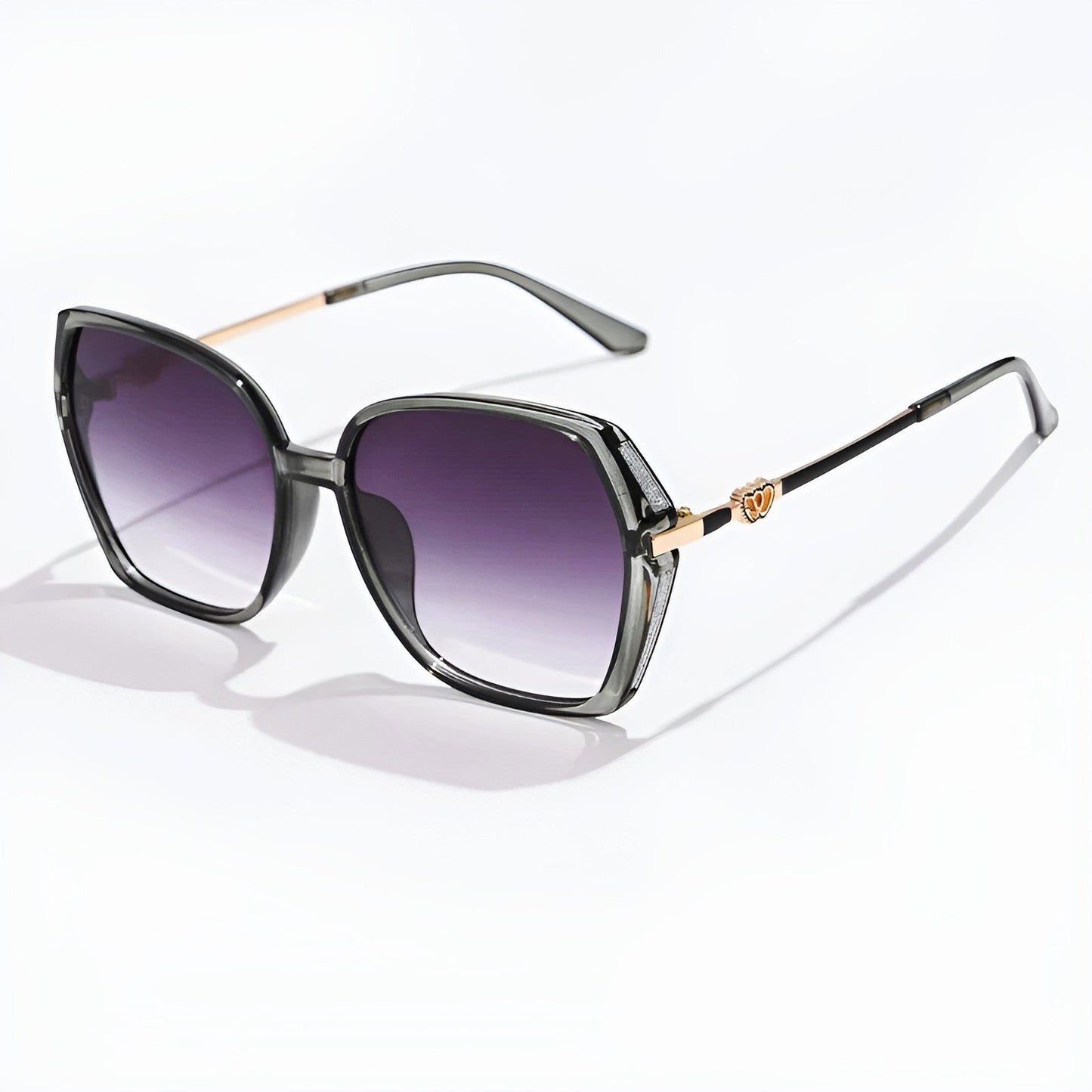 Oversized gradient sunglasses metal frames bold fashion-forward silhouette UV protection tinted lenses