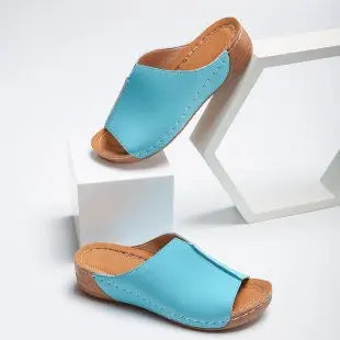 Women's red platform wedge slides with contrast stitching, casual summer footwear with all-day comfort sole