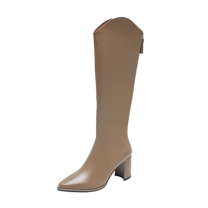 Women's black knee-high heeled boots elegant mid-height heel sleek silhouette day-to-night style