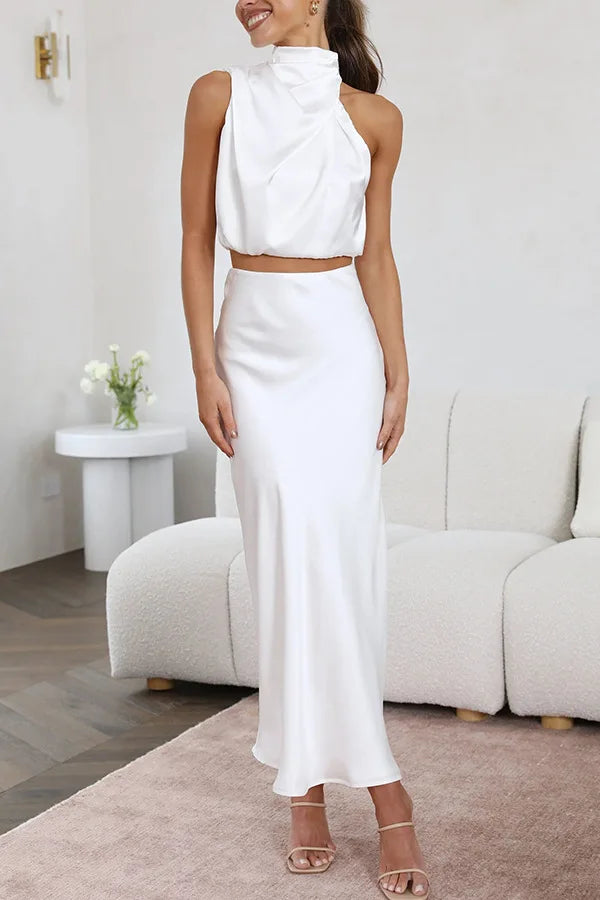Women's elegant two-piece skirt top set with asymmetrical neckline, sleeveless design, button closure