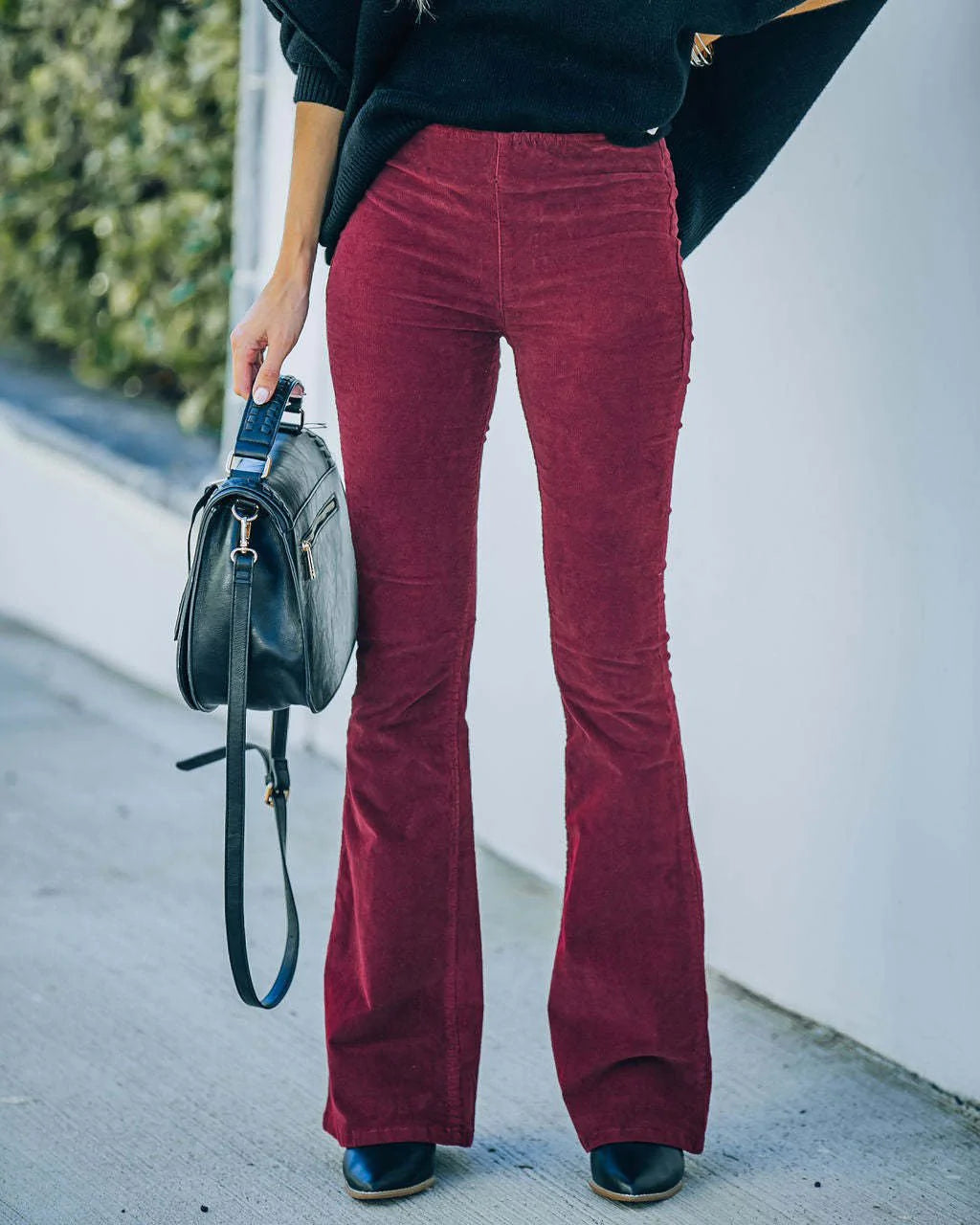 Women's cotton corduroy high-waist flared pants with soft textured finish, casual chic style