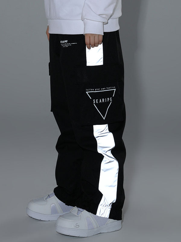 Women's oversized black cargo snow pants 10K waterproof breathable with built-in gaiters for winter sports