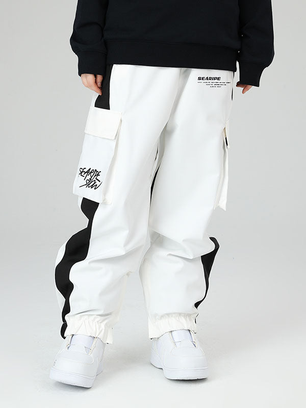 Women's oversized cargo snow pants in bold color, waterproof breathable with built-in gaiters for winter sports
