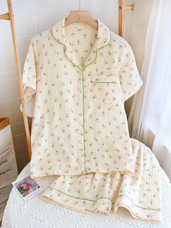 Women's floral print button-up pajama set, two-piece lounge ensemble with delicate feminine pattern