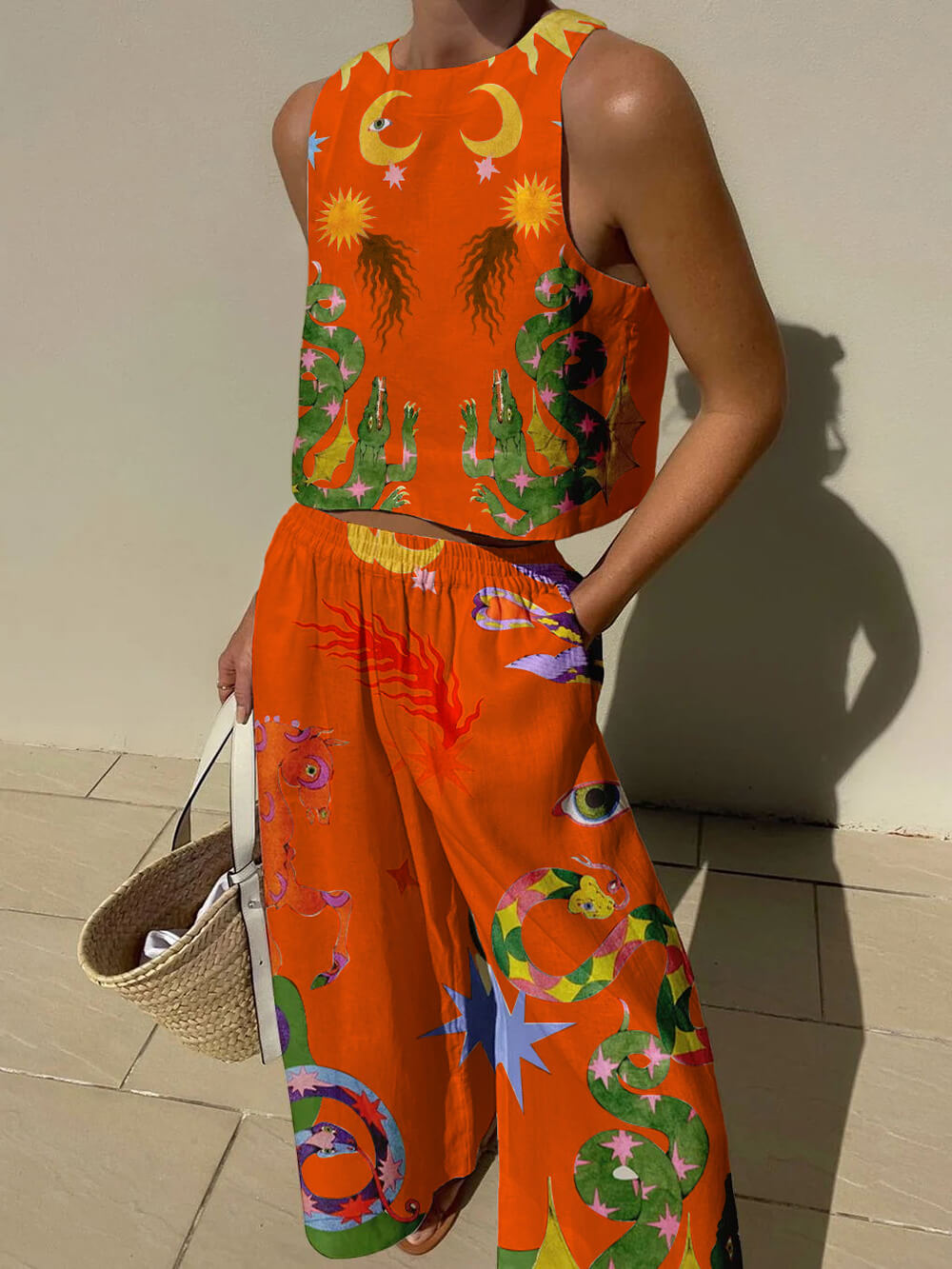 Women's printed tank and elastic waist pants set, sleeveless relaxed fit with matching vibrant pattern