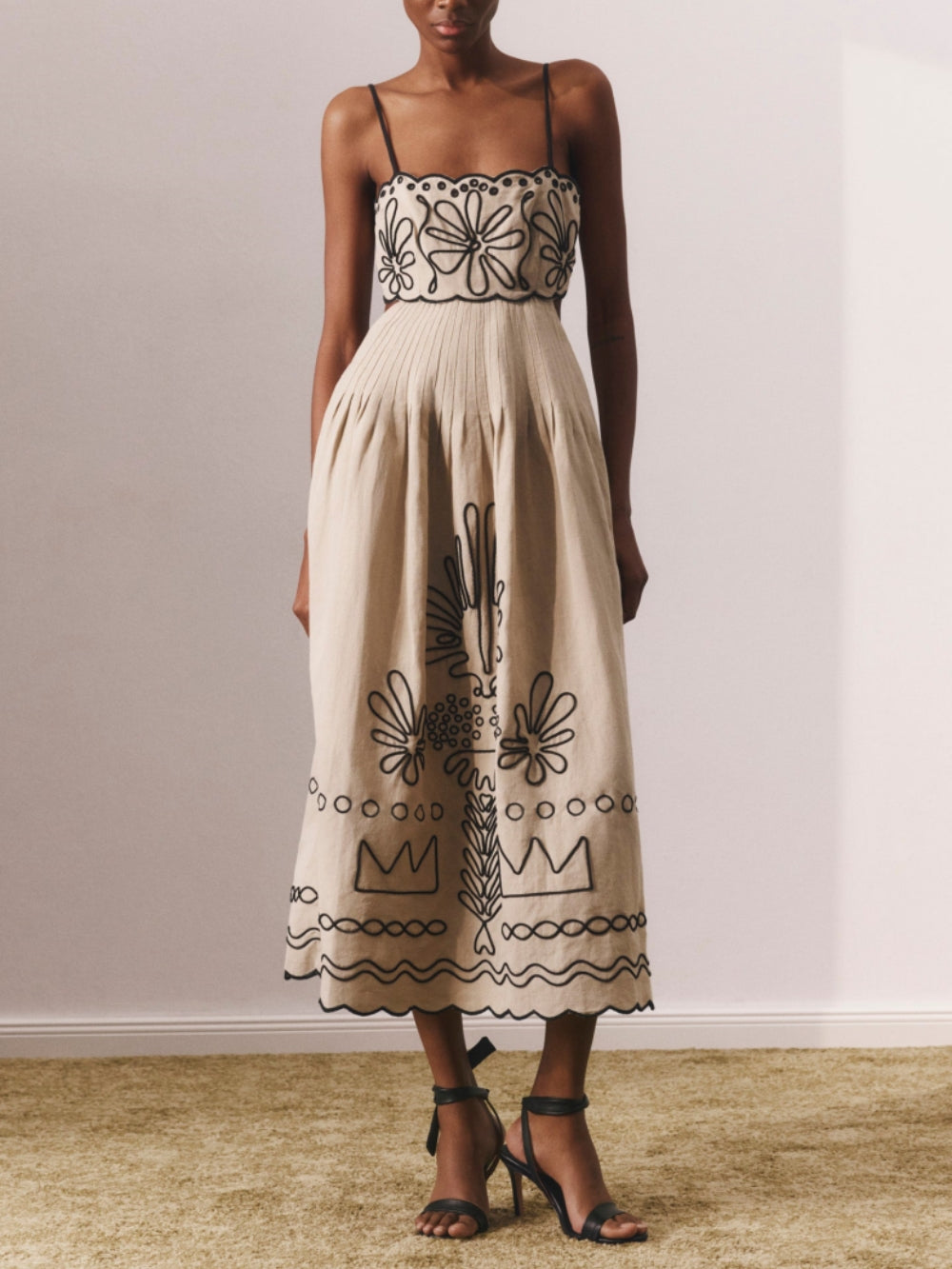 Women's printed spaghetti strap midi dress with wave hem, soft breathable fabric, casual summer style