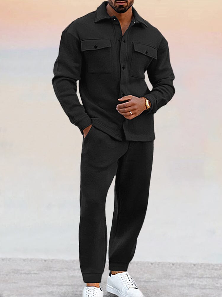 Men's tailored navy jacket and pants set with modern cut, refined casual luxury coordinated ensemble