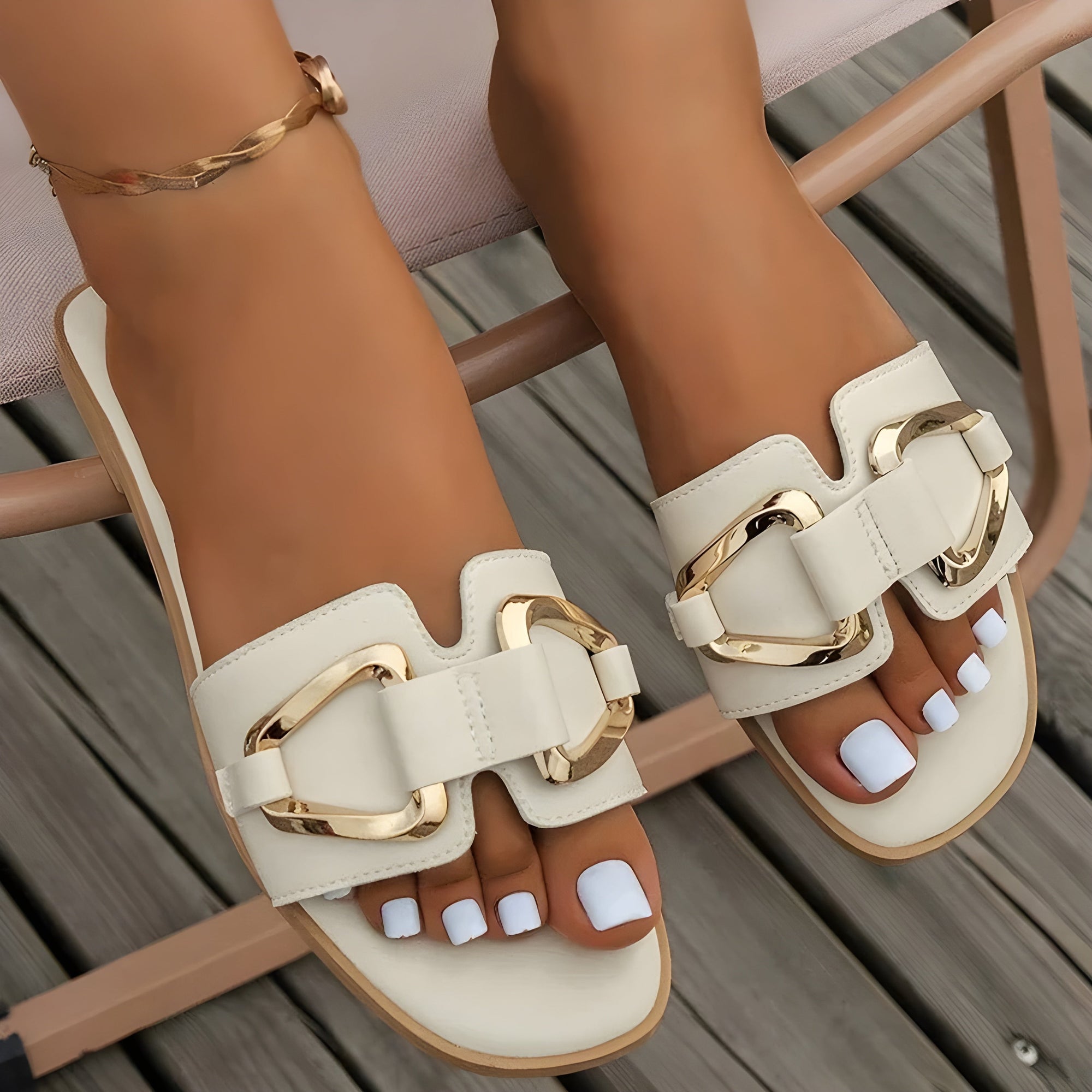 Ivory vegan leather flats with gold buckle detail, polished pointed-toe style for women professionals