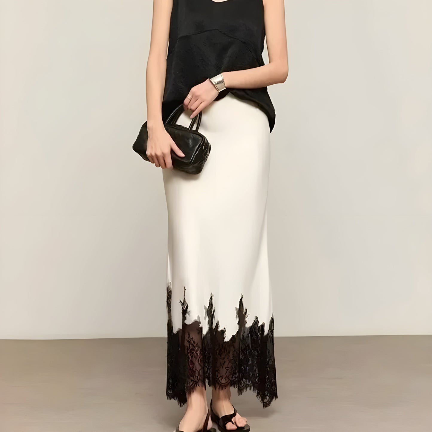 Women's satin A-line skirt with floral lace serrated hem trim, slip-inspired silhouette, subtle sheen