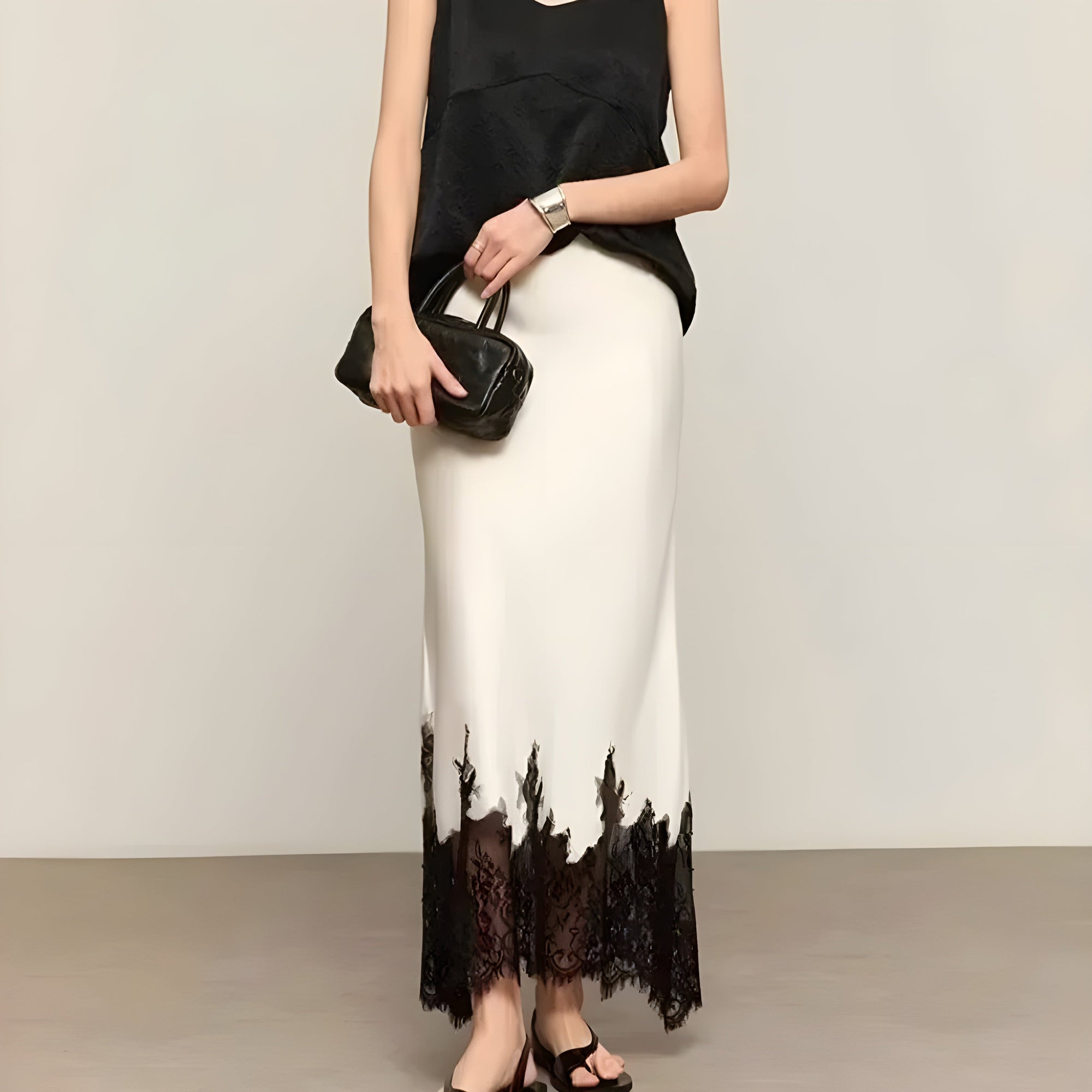 Women's satin A-line skirt with floral lace serrated hem trim, slip-inspired silhouette, subtle sheen