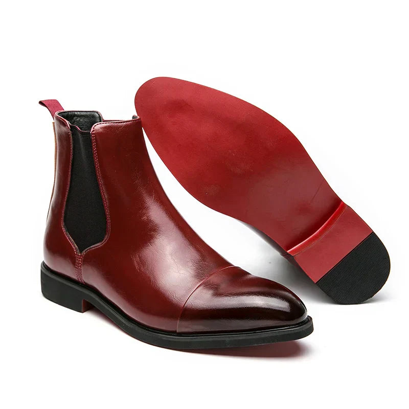 Men's black slip-on business boots with elastic side panels, sleek structured design for professionals